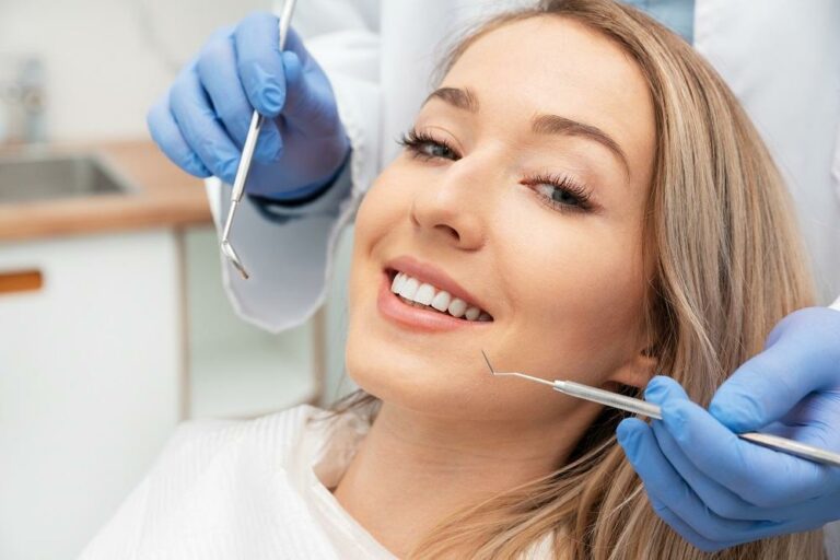 Dental examination in progress with dentist and patient
