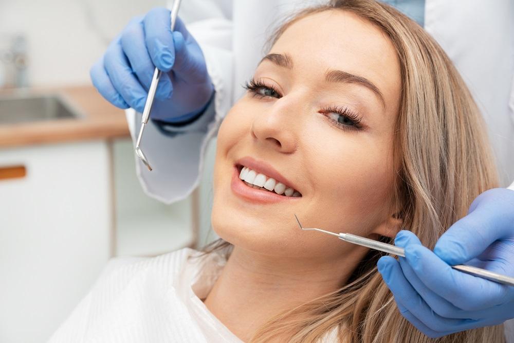 Dental examination in progress with dentist and patient