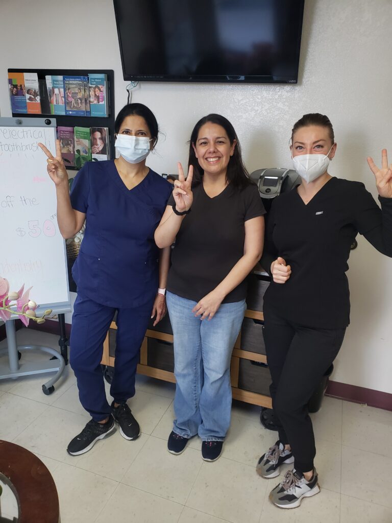 Photo of team or Dedicated dental professionals providing top-quality care at Art Family Dental.